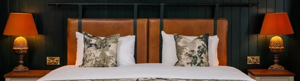 A bed in one of the hotel rooms at Himley House.
