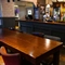 interior of the restaurant and seating area with bar