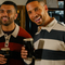 An image of 3 friends with pints of Guinness stood within the interior watching the Six Nations at The Crown.