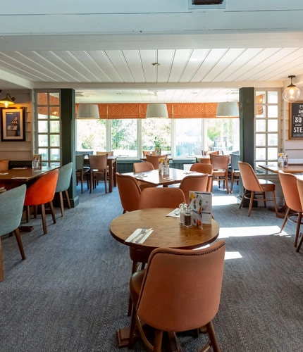 Interior dining area of a pub.