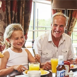 A family enjoying breakfast