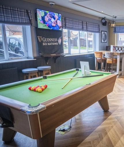 interior seating area with pool table