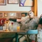 An image of one of the Drag Queens sat within the interior restaurant and seating area at The City Of Quebec.