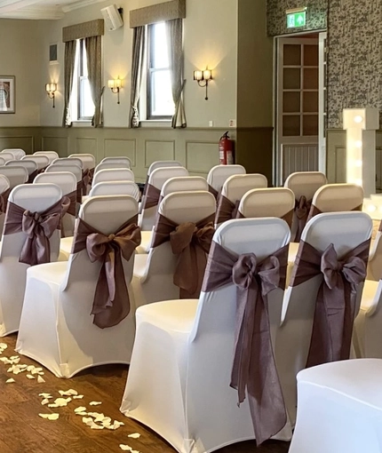 The decorated seating area of the wedding event space at Windmill Farm.