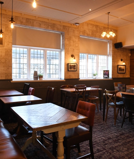 interior restaurant and seating area with tv