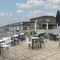 Exterior beer garden of a pub with a seating area.
