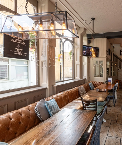 Internal seating area in a pub restaurant