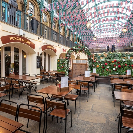 The exterior beer garden seating area of The Punch and Judy in Covent Garden.