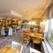 Interior dining area of a pub with a bar.