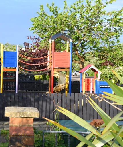 Exterior kids play area of a pub.