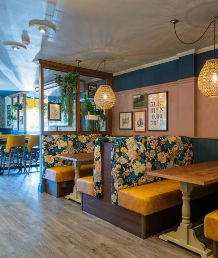 Interior seating and restaurant area of the Buff