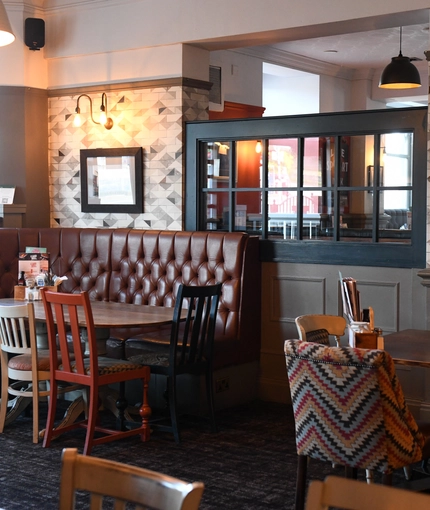 Interior dining area of a pub.
