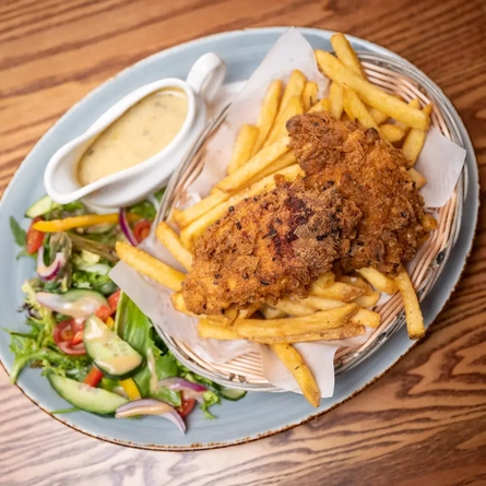 A plate of chicken and chips