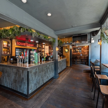 Interior restaurant and seating area with bar