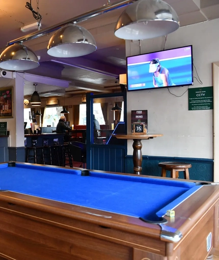 interior area of the pub with pool table