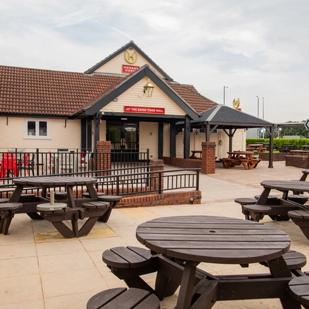 The exterior beer garden and seating area at the Poachers.