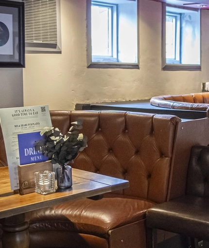 The interior restaurant seating area at The Bull.