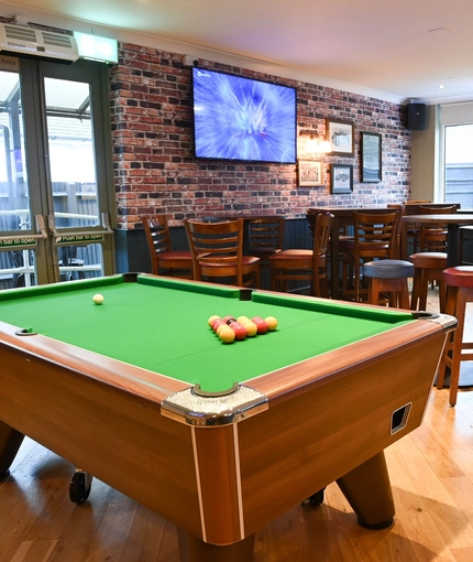 Interior seating area with a pool table
