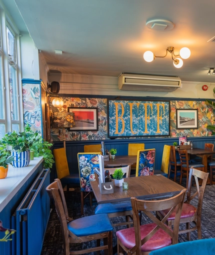 Interior restaurant and seating area of the Buff