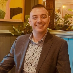 A portrait image of Daniel Ilchovski, the General Manager at The Crown.