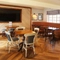 Interior dining area of a pub with a TV.