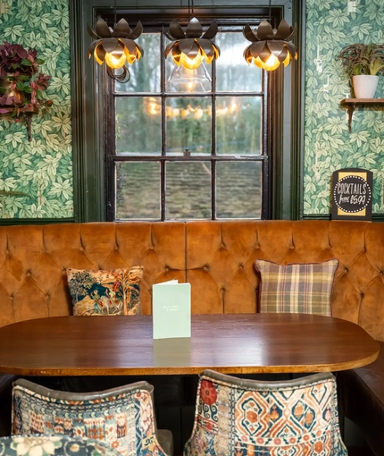 A restaurant booth in The Rockingham Arms.