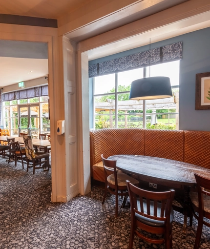 Interior dining area of a pub.