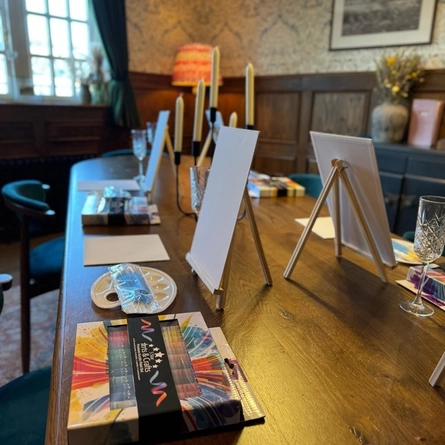 An image advertising a Brushes and Bubbles What's On event at The Watermill.