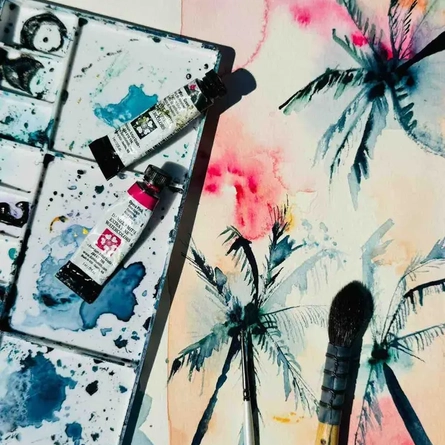 A watercolour painting, next to a paintbrush and some watercolour paints.