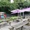 exterior beer garden of a pub with a seating area and a play area