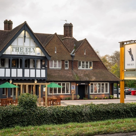 The exterior facade and outdoor seating at the Ely.