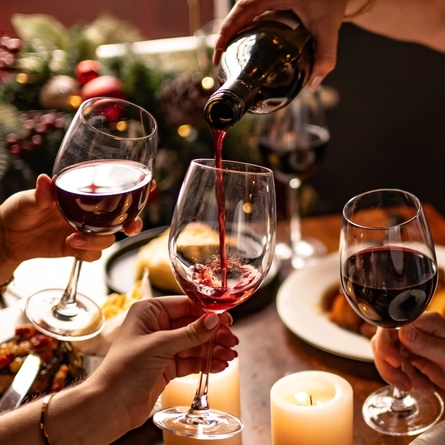 Christmas_P&V_MPCo_Product-Lifestyle_Red-Wine-Cheers_2024_001.jpg