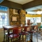 The restaurant area of the Woodman Inn.