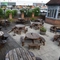 Exterior beer garden of a pub with a seating area.