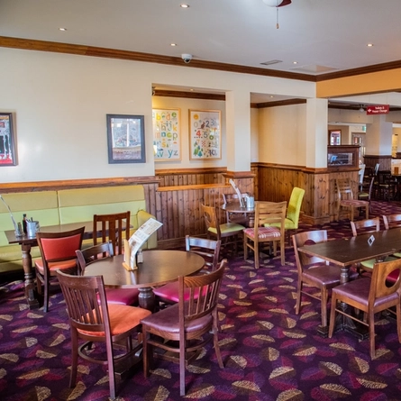 Interior dining area of a pub.