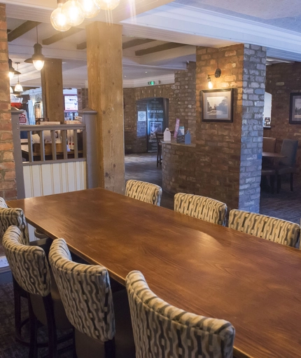 Interior dining area of a pub.