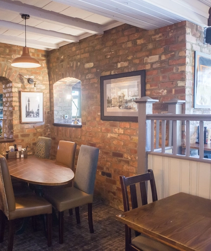 Interior dining area of a pub.