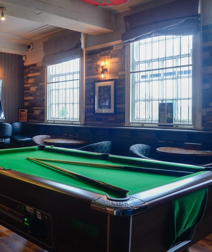 interior seating area and pool table