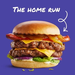 A banner promoting national cheeseburger day at Hungry Horse.