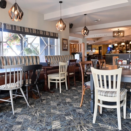 The interior restaurant seating area at The Kingfisher.