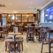The interior restaurant and seating area with bar at the Poachers.