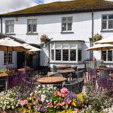 Exterior view of a pub and beer garden