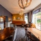 Interior dining area of a pub.