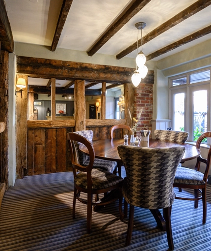A table in the restaurant of the Wheatsheaf.