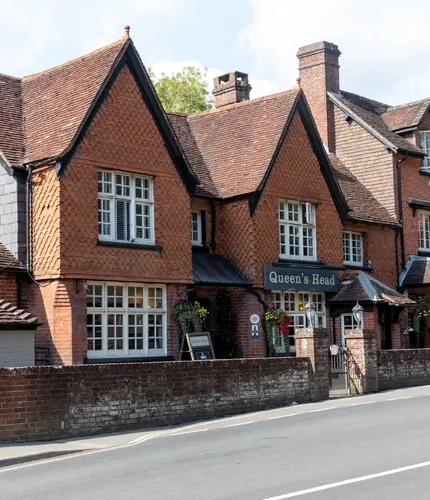 The exterior of The Queen's Head pub