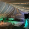 A marquee, decorated for a wedding.
