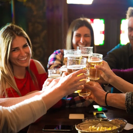 Guests enjoying a pint of beer in the pub