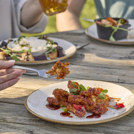 New menu Lifestyle image of food on a table outdoors