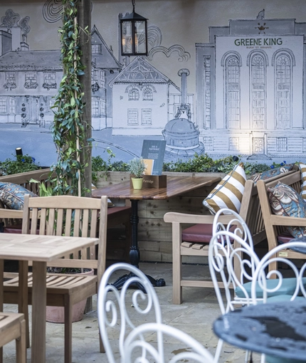 Some tables in the beer garden of the Rothley Court Hotel.