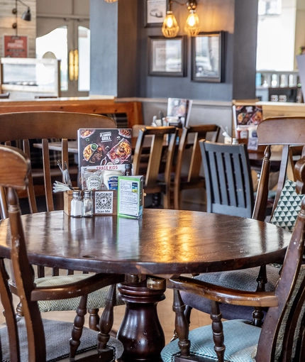Interior dining area of a pub.